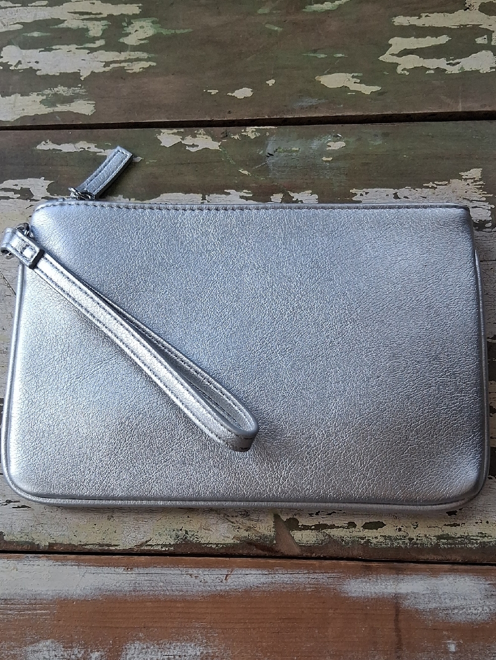 Express Silver Wristlet With Black Quilted Interior Lining